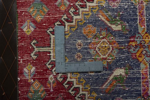 Backside of handmade 2000s Shiraz rug showing knot structure and weave density