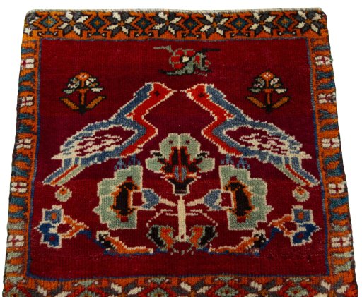 Surface texture of 2000s Shiraz rug with natural Wool and intricate pattern