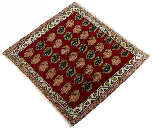Corner detail of 2000s Shiraz rug showing border pattern and Wool pile