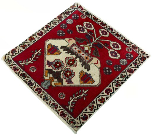 Corner detail of 2000s Shiraz rug showing border pattern and Wool pile