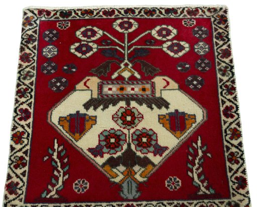 Surface texture of 2000s Shiraz rug with natural Wool and intricate pattern