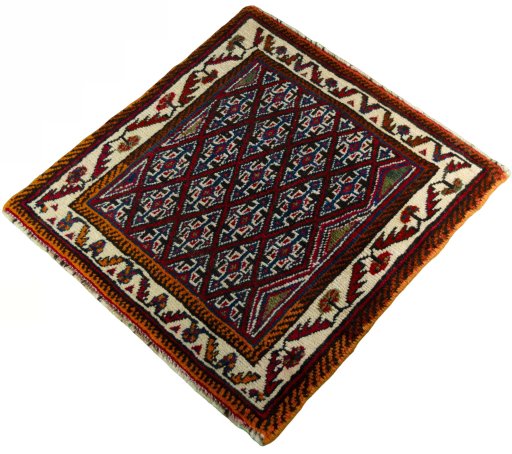 Corner detail of 2000s Shiraz rug showing border pattern and Wool pile