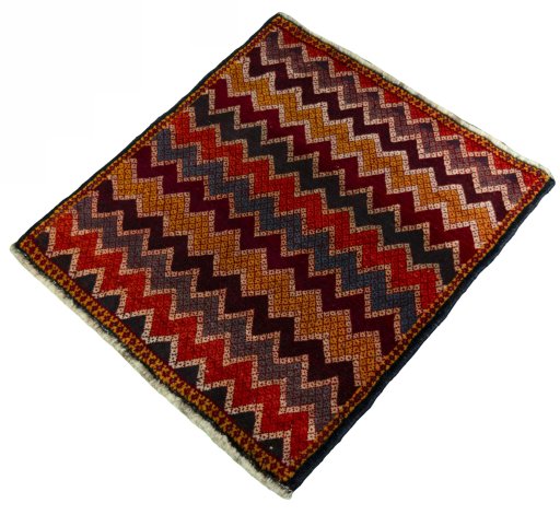 Corner detail of 2000s Shiraz rug showing border pattern and Wool pile