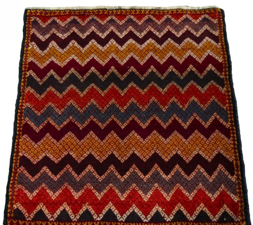 Surface texture of 2000s Shiraz rug with natural Wool and intricate pattern
