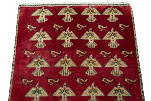 Surface texture of 2000s Shiraz rug with natural Wool and intricate pattern