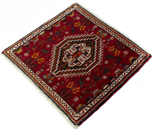 Corner detail of 2000s Shiraz rug showing border pattern and Wool pile