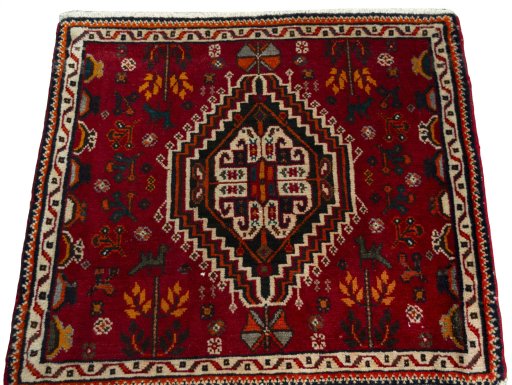 Surface texture of 2000s Shiraz rug with natural Wool and intricate pattern