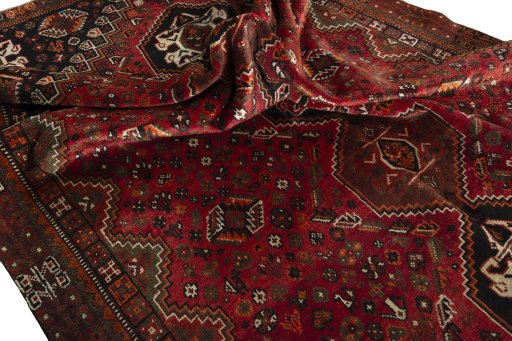 Corner detail of 1970s Shiraz rug showing border pattern and Wool pile