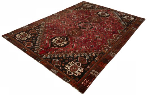 Corner detail of 1970s Shiraz rug showing border pattern and Wool pile