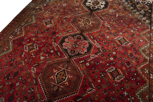 Backside of handmade 1970s Shiraz rug showing knot structure and weave density