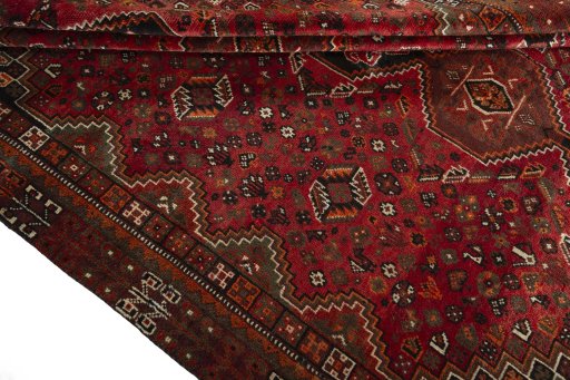 Full view of 1970s Shiraz rug from Iran / Persia, 295 × 210 cm in Red tones