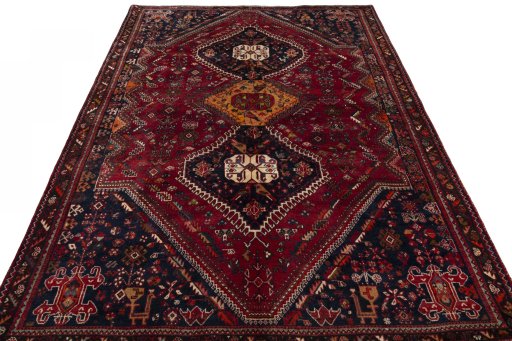 Surface texture of 1970s Shiraz rug with natural Wool and intricate pattern