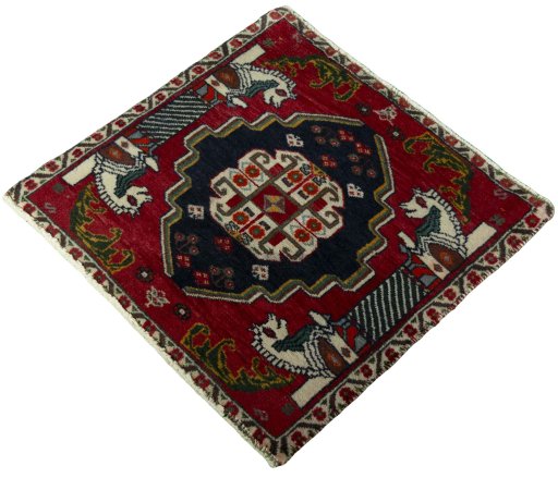 Corner detail of 2000s Shiraz rug showing border pattern and Wool pile