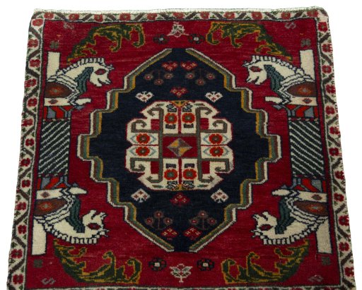 Surface texture of 2000s Shiraz rug with natural Wool and intricate pattern