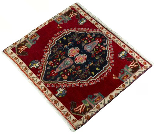 Corner detail of 2000s Shiraz rug showing border pattern and Wool pile