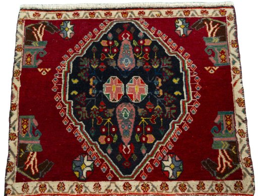 Surface texture of 2000s Shiraz rug with natural Wool and intricate pattern