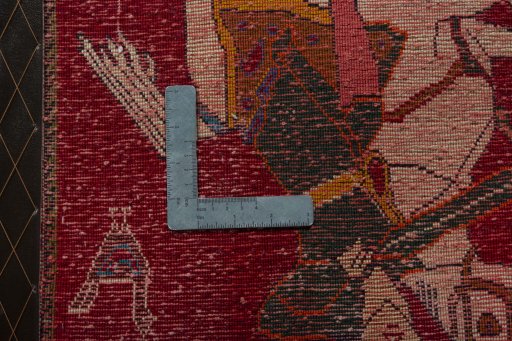 Backside of handmade 2000s Shiraz rug showing knot structure and weave density