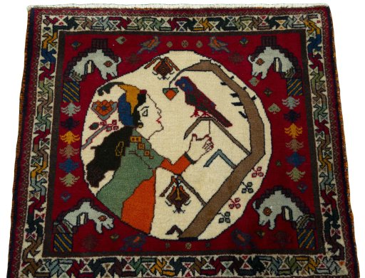 Surface texture of 2000s Shiraz rug with natural Wool and intricate pattern