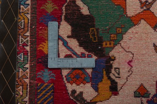 Backside of handmade 2000s Shiraz rug showing knot structure and weave density