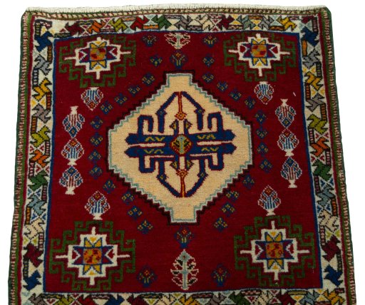 Surface texture of 2000s Shiraz rug with natural Wool and intricate pattern