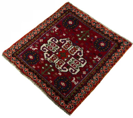 Corner detail of 2000s Shiraz rug showing border pattern and Wool pile