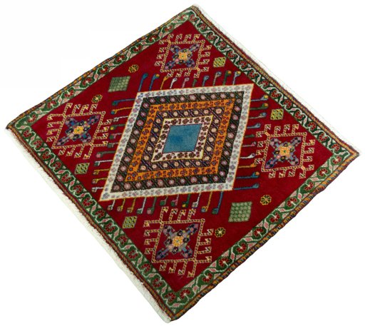 Corner detail of 2000s Shiraz rug showing border pattern and Wool pile