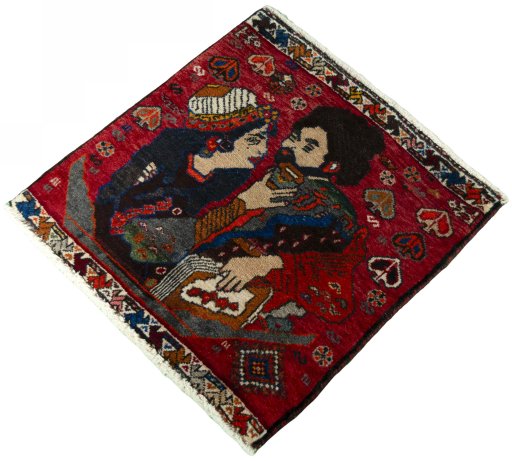 Corner detail of 2000s Shiraz rug showing border pattern and Wool pile