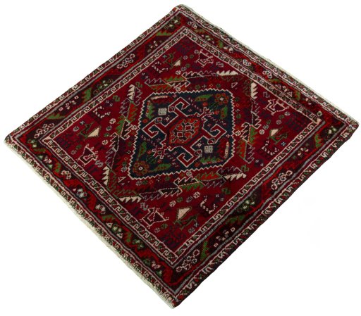 Corner detail of 2000s Shiraz rug showing border pattern and Wool pile
