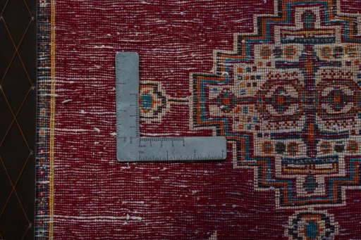 Backside of handmade 2000s Shiraz rug showing knot structure and weave density