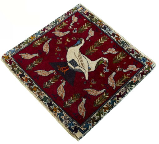 Corner detail of 2000s Shiraz rug showing border pattern and Wool pile