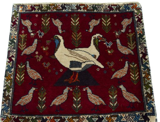 Surface texture of 2000s Shiraz rug with natural Wool and intricate pattern