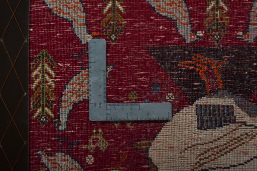 Backside of handmade 2000s Shiraz rug showing knot structure and weave density