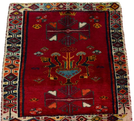 Surface texture of 2000s Shiraz rug with natural Wool and intricate pattern