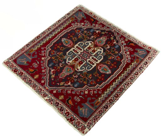 Corner detail of 2000s Shiraz rug showing border pattern and Wool pile