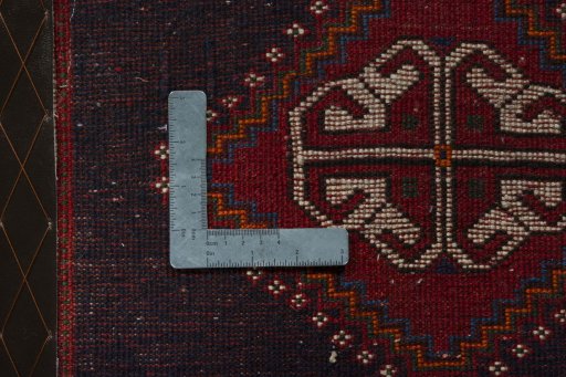 Backside of handmade 2000s Shiraz rug showing knot structure and weave density