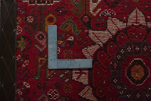 Surface texture of 2000s Shiraz rug with natural Wool and intricate pattern