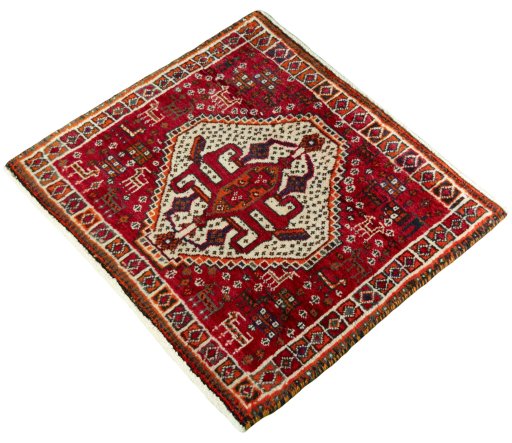 Corner detail of 2000s Shiraz rug showing border pattern and Wool pile