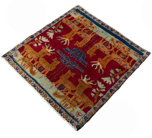 Corner detail of 2000s Shiraz rug showing border pattern and Wool pile