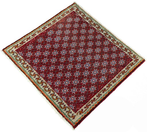 Corner detail of 2000s Shiraz rug showing border pattern and Wool pile