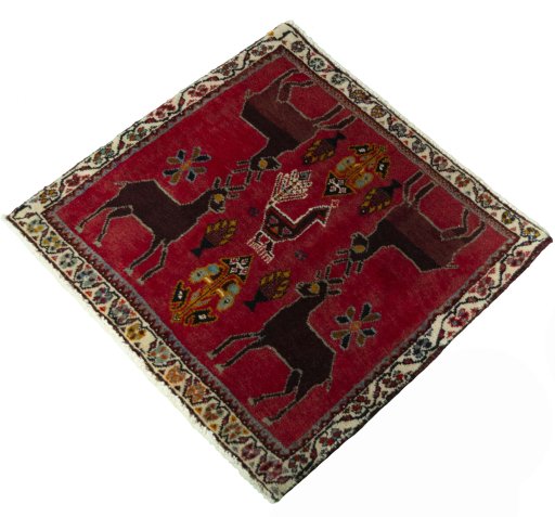 Corner detail of 2000s Shiraz rug showing border pattern and Wool pile