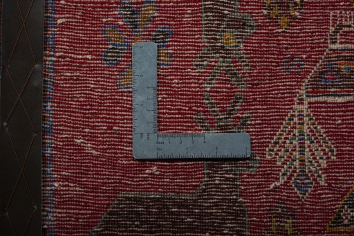 Backside of handmade 2000s Shiraz rug showing knot structure and weave density