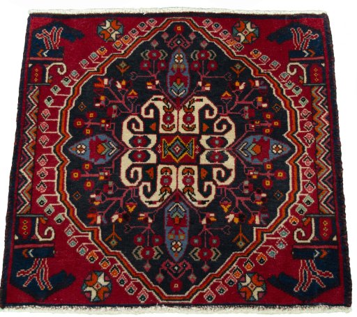 Surface texture of 2000s Shiraz rug with natural Wool and intricate pattern