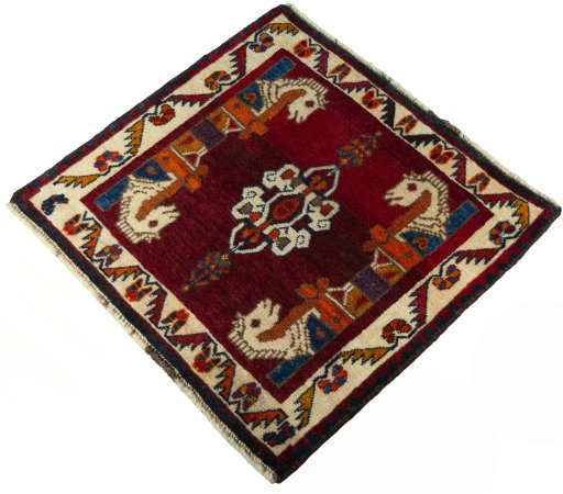 Corner detail of 2000s Shiraz rug showing border pattern and Wool pile