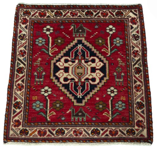 Surface texture of 2000s Shiraz rug with natural Wool and intricate pattern