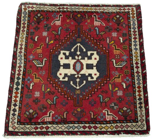 Surface texture of 2000s Shiraz rug with natural Wool and intricate pattern