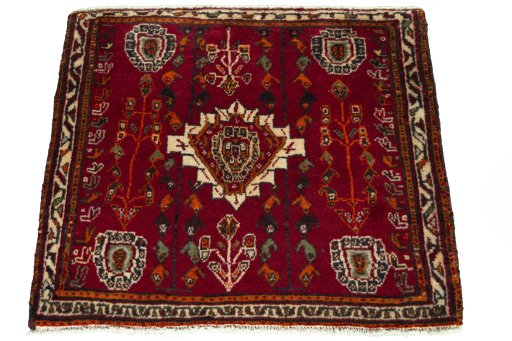 Surface texture of 2000s Shiraz rug with natural Wool and intricate pattern