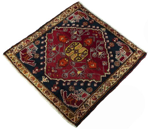 Corner detail of 2000s Shiraz rug showing border pattern and Wool pile
