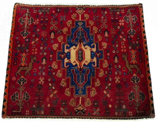 Surface texture of 2000s Shiraz rug with natural Wool and intricate pattern