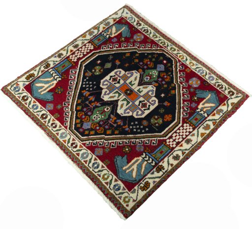 Corner detail of 2000s Shiraz rug showing border pattern and Wool pile