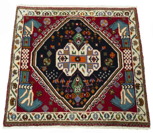 Surface texture of 2000s Shiraz rug with natural Wool and intricate pattern